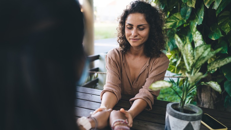 Woman having conversation with friend