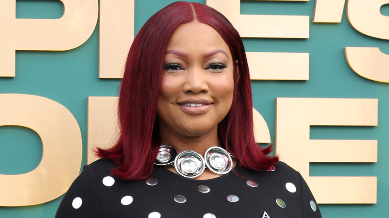 Garcelle Beauvais wearing red hair at the People's Choice Awards