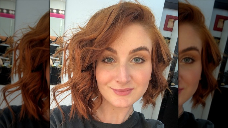 Woman with red wavy bob