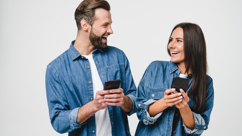 Man and woman smiling together