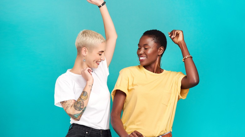 Two women dancing together