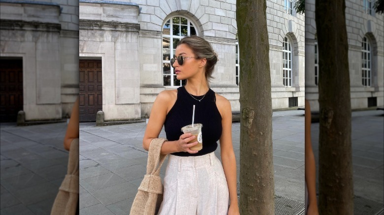 Girl wearing a high-neck tank top.