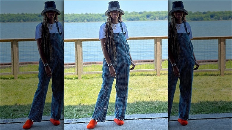 woman wearing denim bucket hat