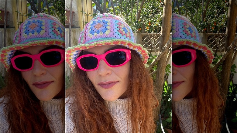 woman wearing granny squares crocheted bucket hat