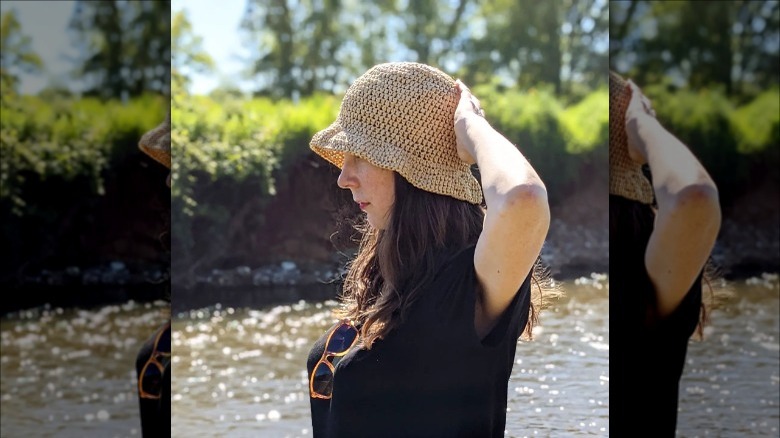 woman wearing crocheted bucket hat