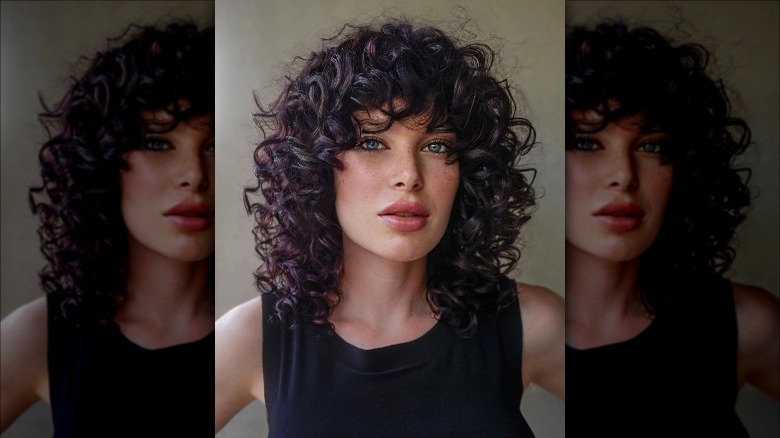 Woman showing off her curls