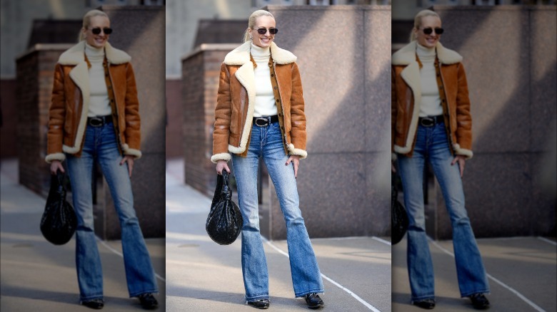 Woman wearing shearling jacket