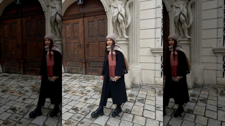 woman wearing plaid scarf with black outfit