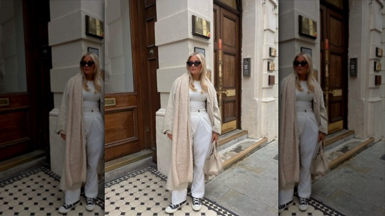 woman with white outfit and cream scarf