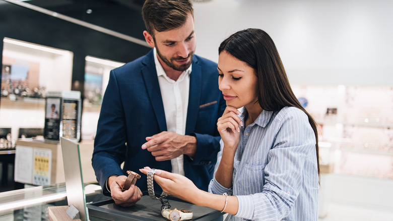 two people watch shopping