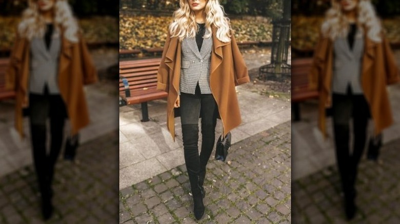 Camel coat with a blazer and boots