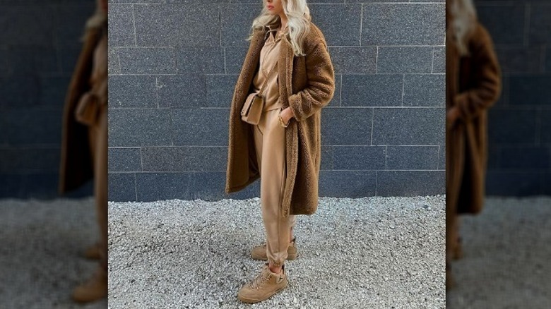 Camel coat with an athleisure outfit