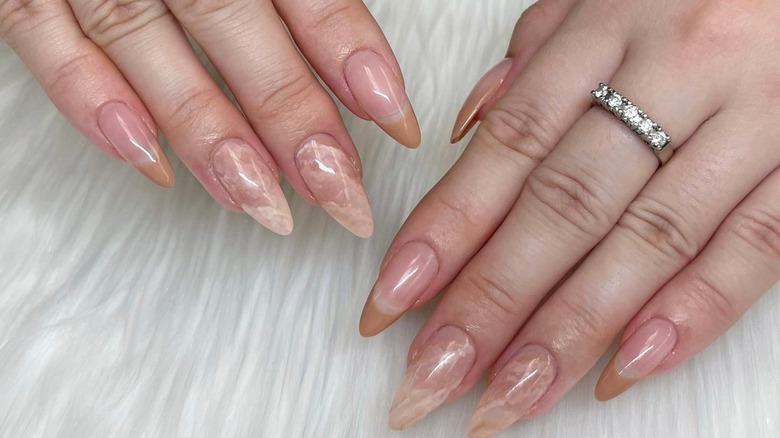 pointed almond nails with milky marbled effect