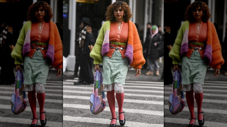 woman wearing multi-colored cardigan