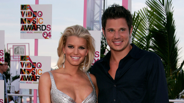 Jessica Simpson and Nick Lachey smiling