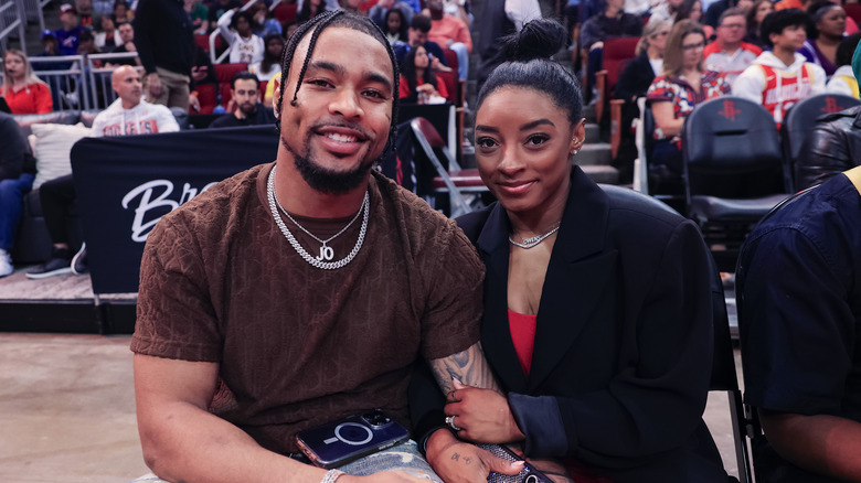 Simone Biles and Jonathan Owens smiling