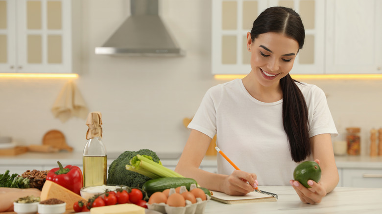 Woman with long hair eating healthy 