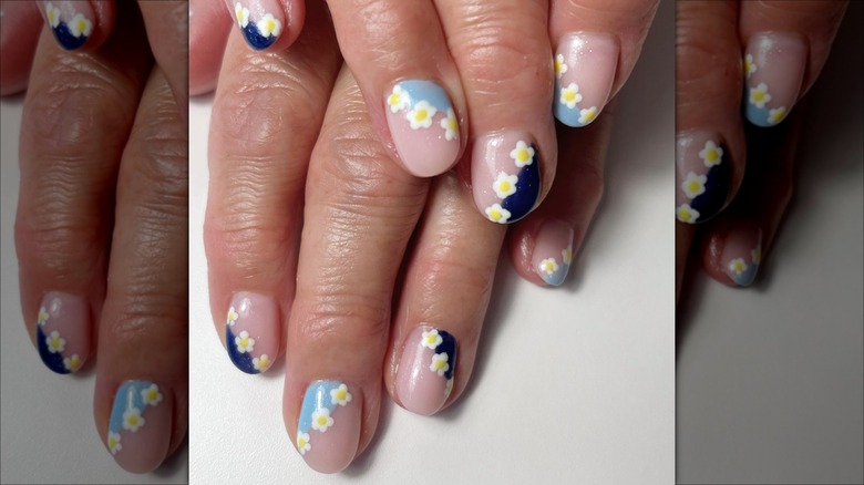 Blue abstract French tips with flowers