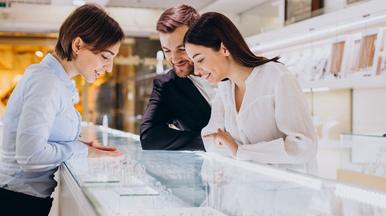 Couple shopping at jewelry store