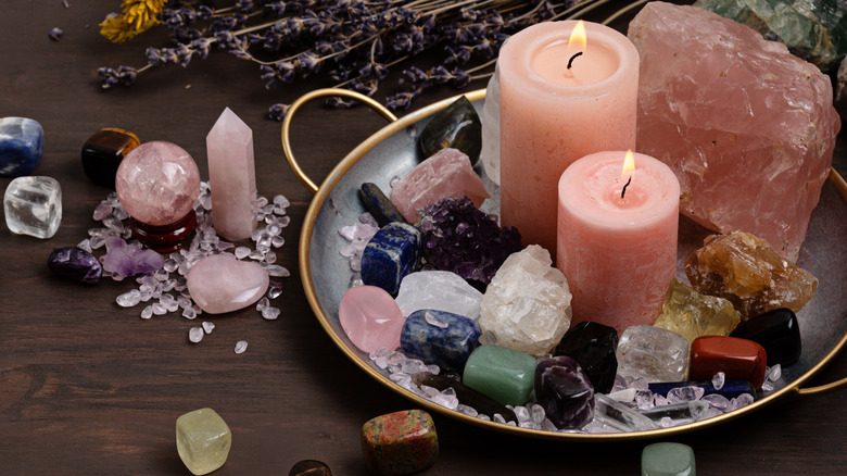 collection of crystals and candles