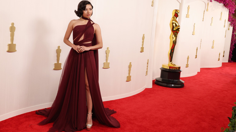 Xochitl Gomez 2024 Oscars maroon dress