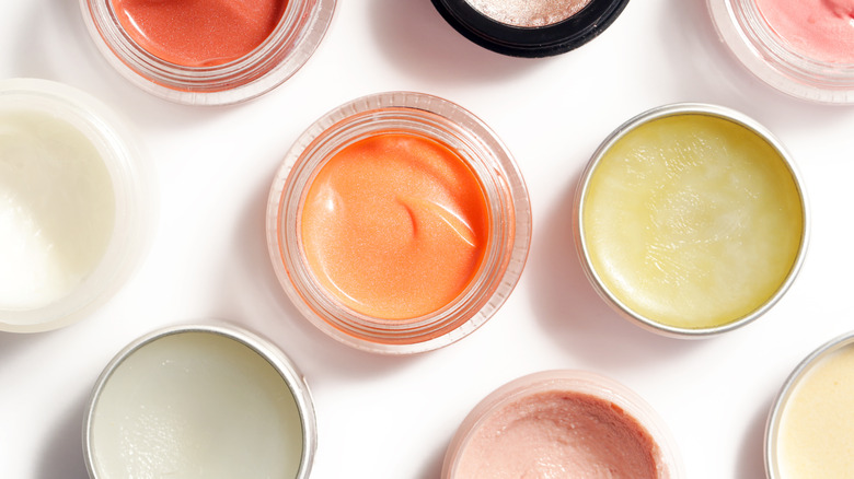 Cream makeup jars on a table