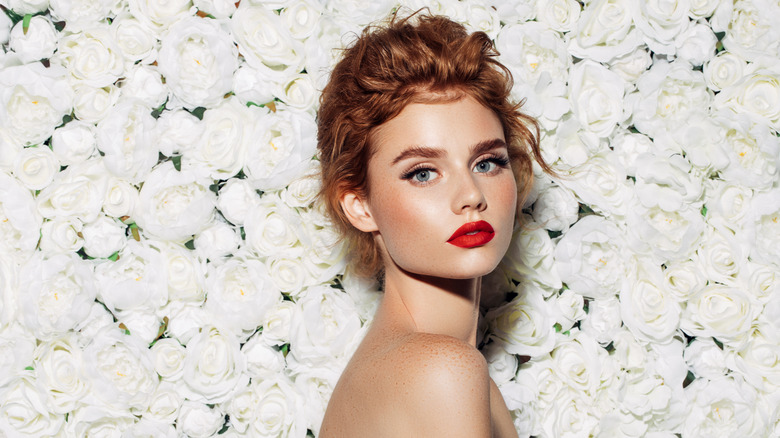 Redheaded woman with red lipstick