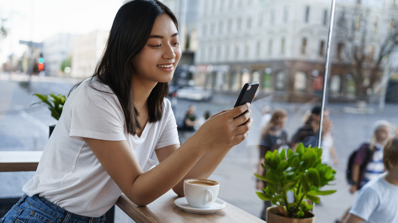 person looking at their phone