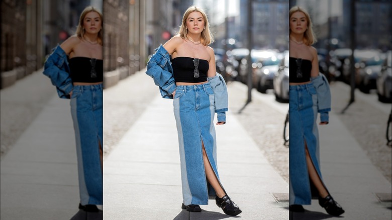 Amelie Stanescu wearing denim maxi skirt and jacket