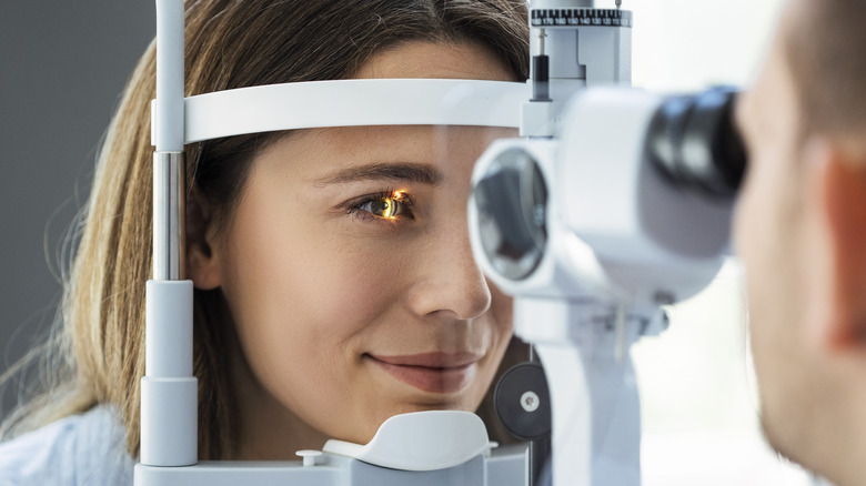 woman getting eye exam