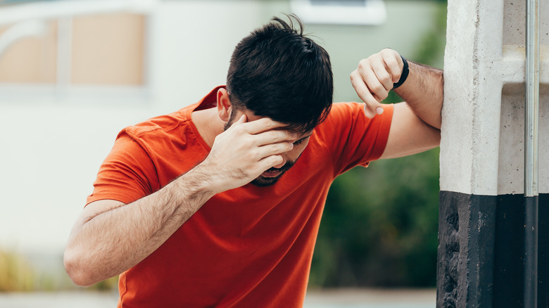 A man experiencing dizziness