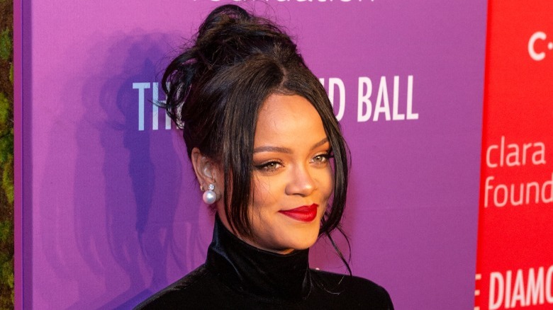Rihanna with a bun and face-framing pieces