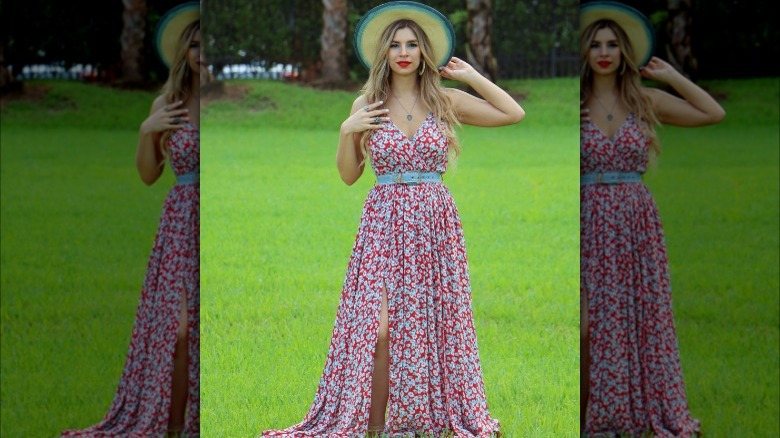 Girl wearing a denim belt with a dress