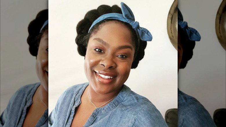 Hairstylist wearing a denim headband