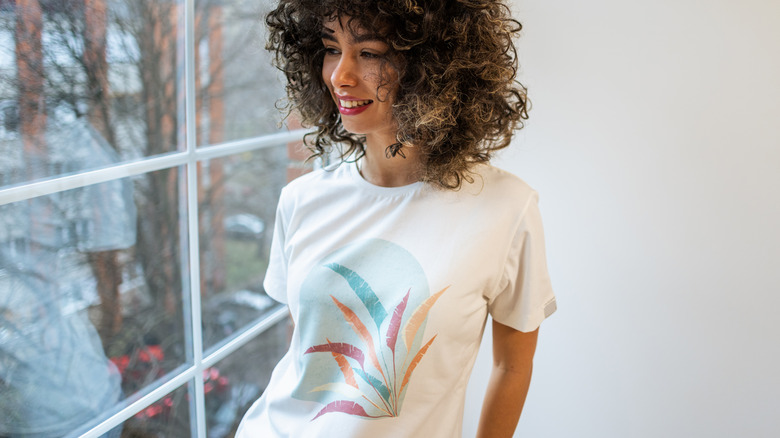 Smiling woman wearing vintage t-shirt