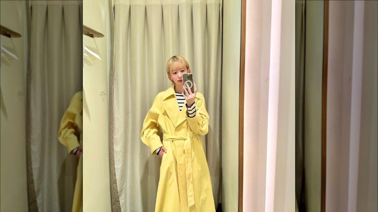 Yellow trenchcoat on woman