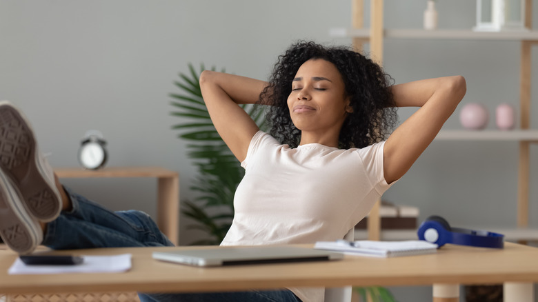 Woman relaxing at work