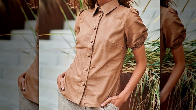 Woman in leather shirt