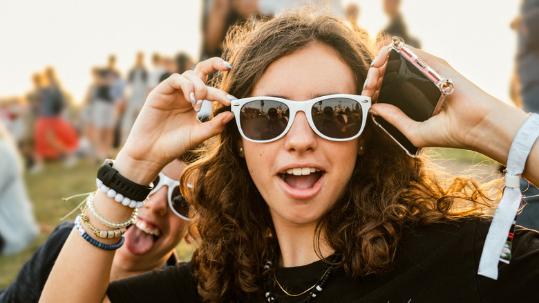 Wearing sunglasses at music festival