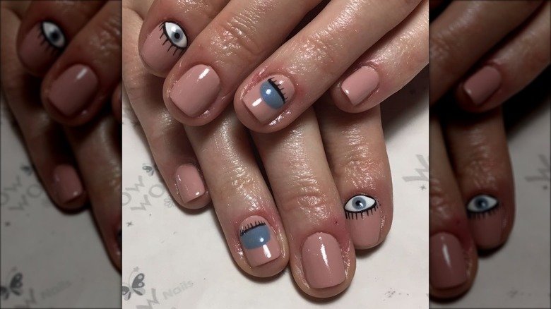 gray evil eye nails