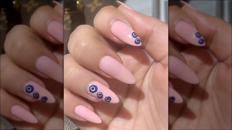 perfectly messy evil eye nails