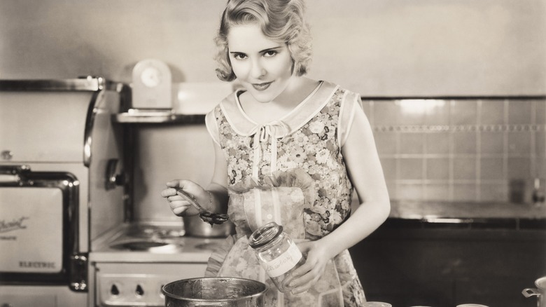 1930s woman making preserves