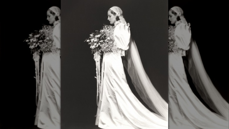 A woman in a '30s wedding gown