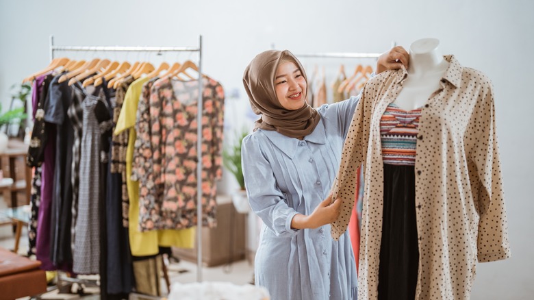 Woman shopping at boutique 