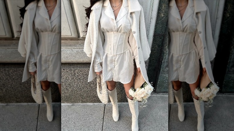 woman wearing all white outfit with white corset