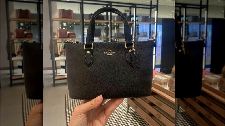 Small black top-handle bag 