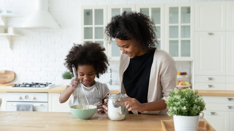 Mother and daughter bake together 