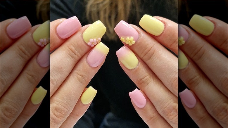 woman with pink yellow french fade nails