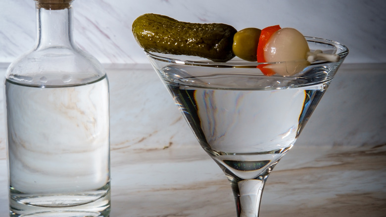 Martini with pickle garnish