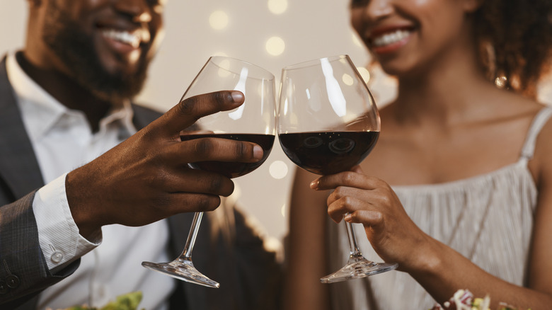 couple celebrating with wine
